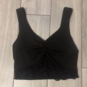 A small black, V neck, Lace Crop top